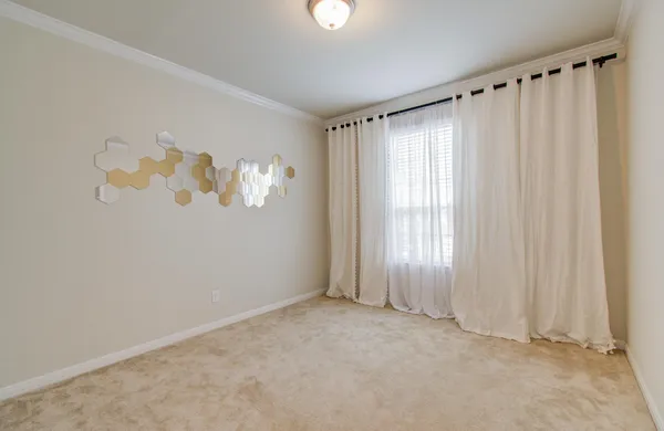 a white toilet sitting next to a bath tub