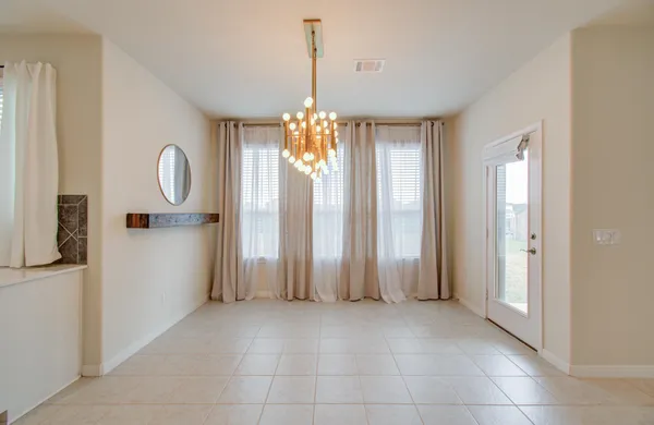 a view of a bathroom with a shower and a sink