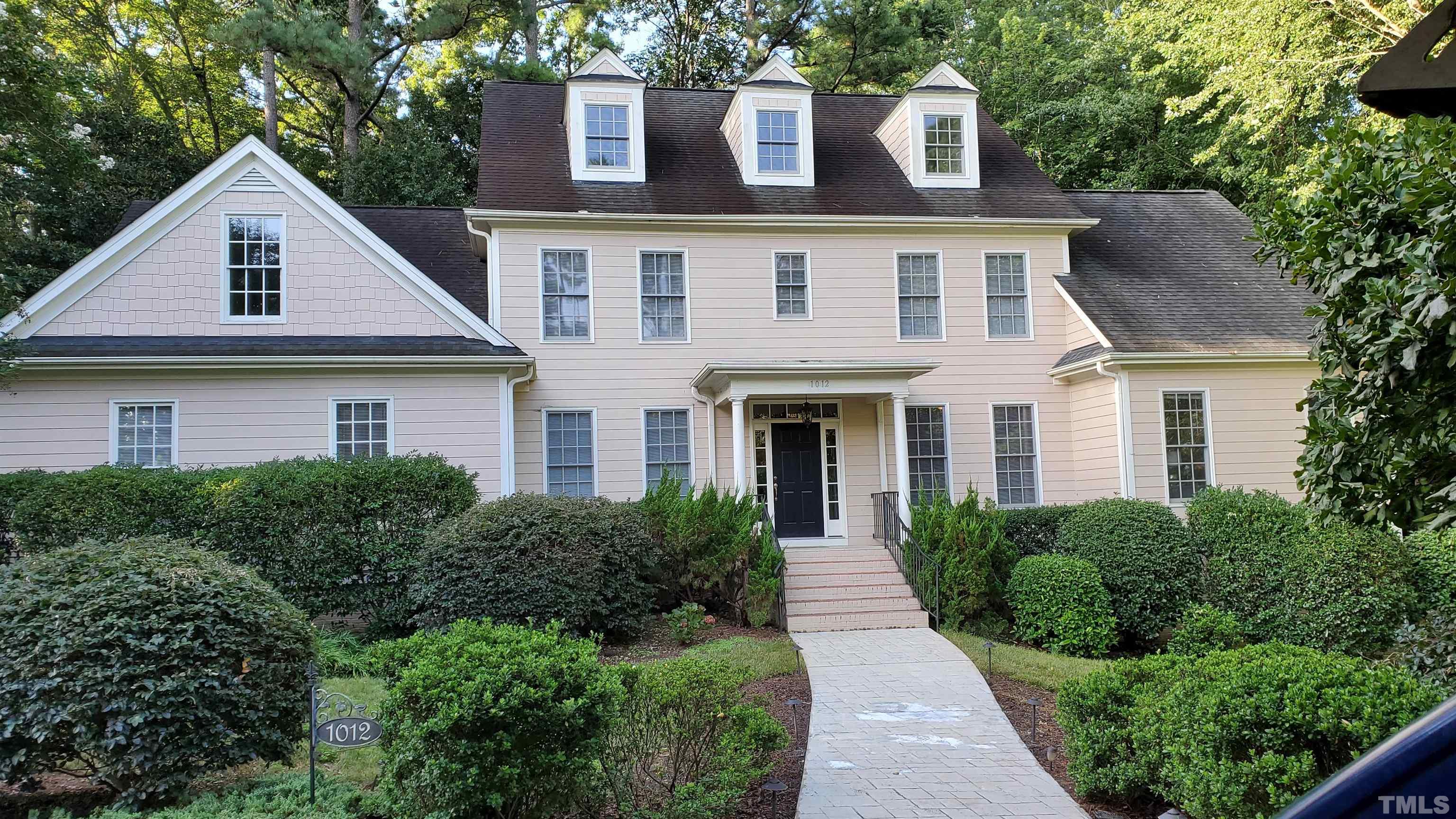 1012 Tyrrell Road Raleigh, NC 27609 - Photo 1 of 24 a view of a yard in front of house