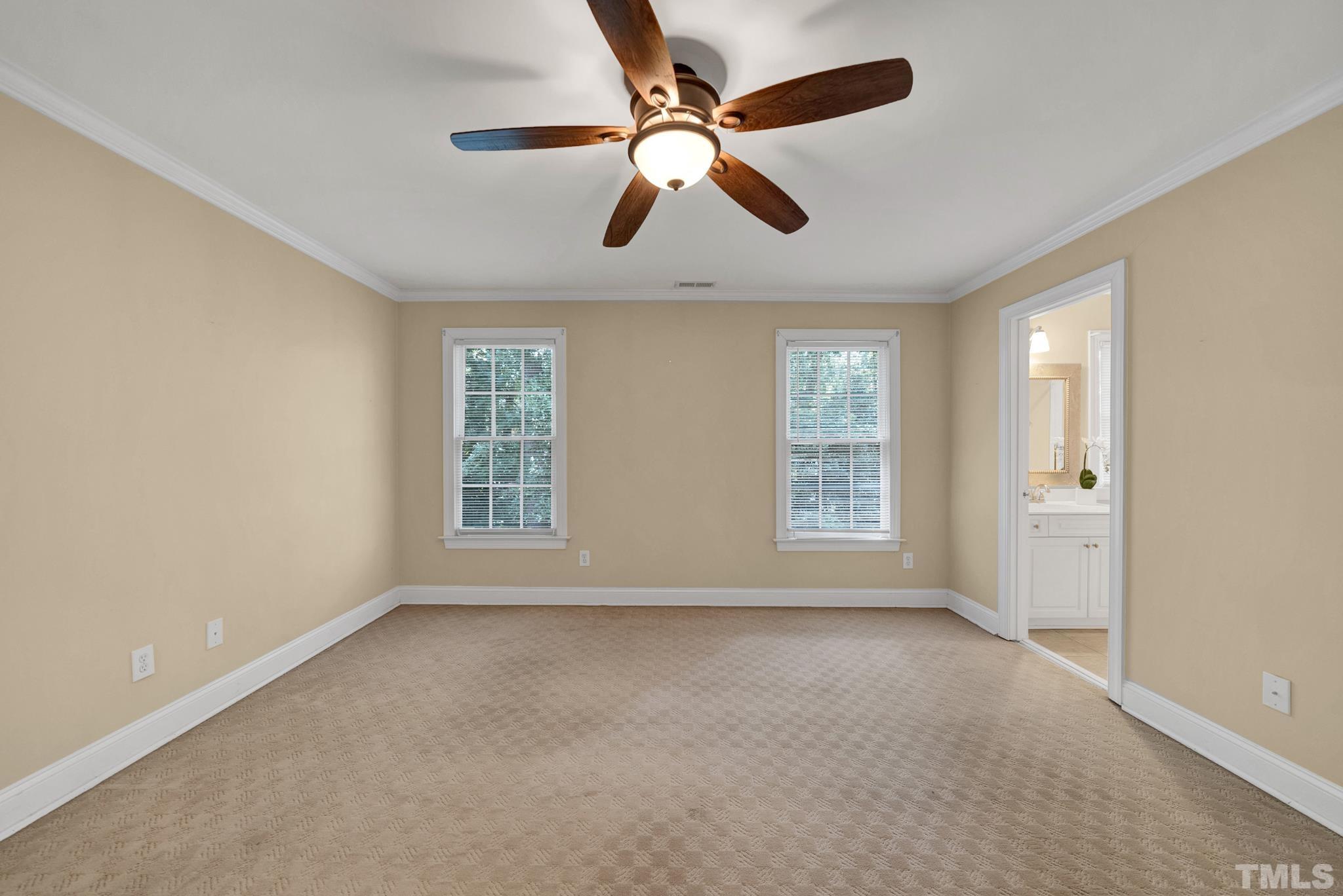 1012 Tyrrell Road Raleigh, NC 27609 - Photo 13 of 24 a view of an empty room with a window