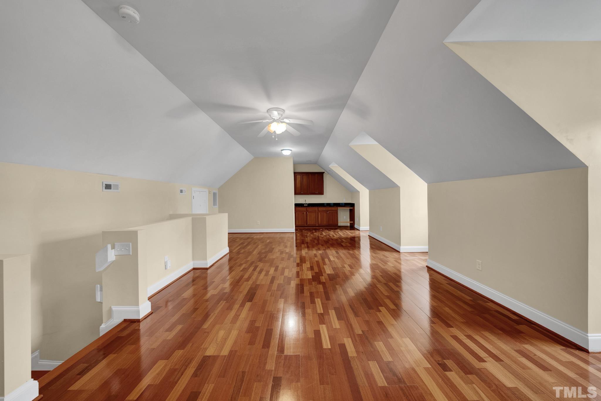 1012 Tyrrell Road Raleigh, NC 27609 - Photo 23 of 24 a view of empty room with wooden floor