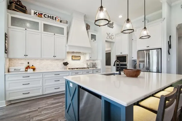 a bedroom with a bed and a desk