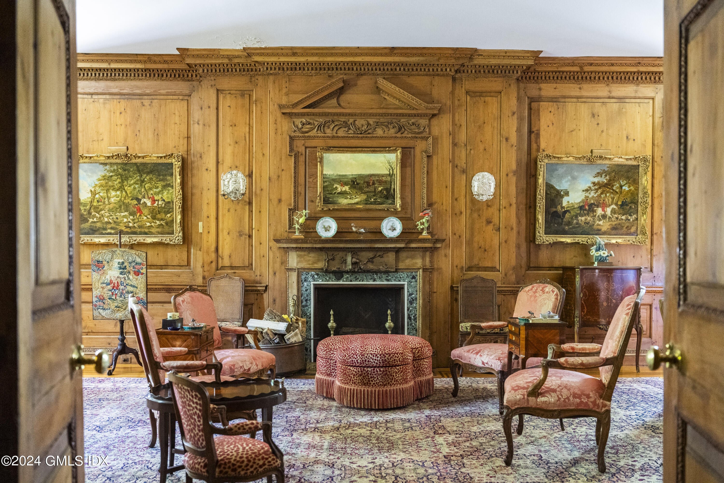 10 Cliffdale Road Greenwich, CT 06831 - Photo 11 of 31 a living room with furniture and a fireplace