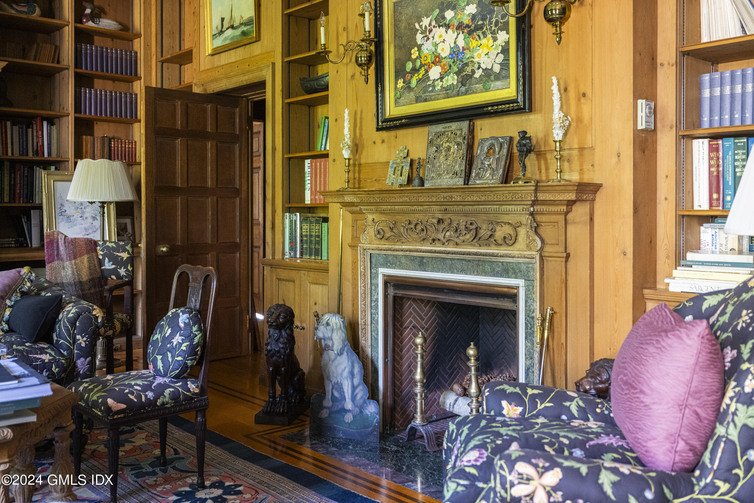 10 Cliffdale Road Greenwich, CT 06831 - Photo 12 of 31 a view of a livingroom with furniture and a fireplace