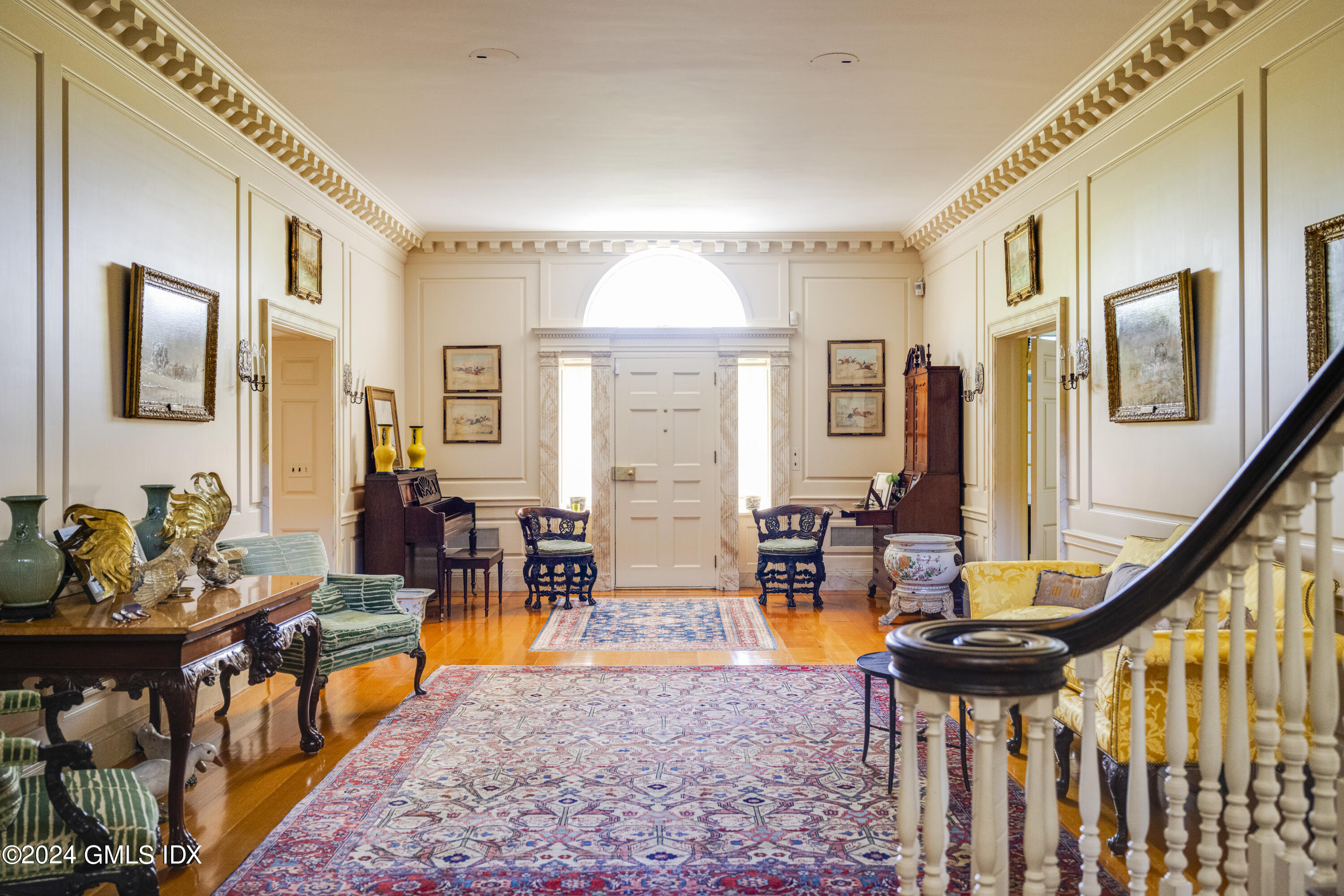 10 Cliffdale Road Greenwich, CT 06831 - Photo 6 of 31 a living room with fireplace furniture and a table
