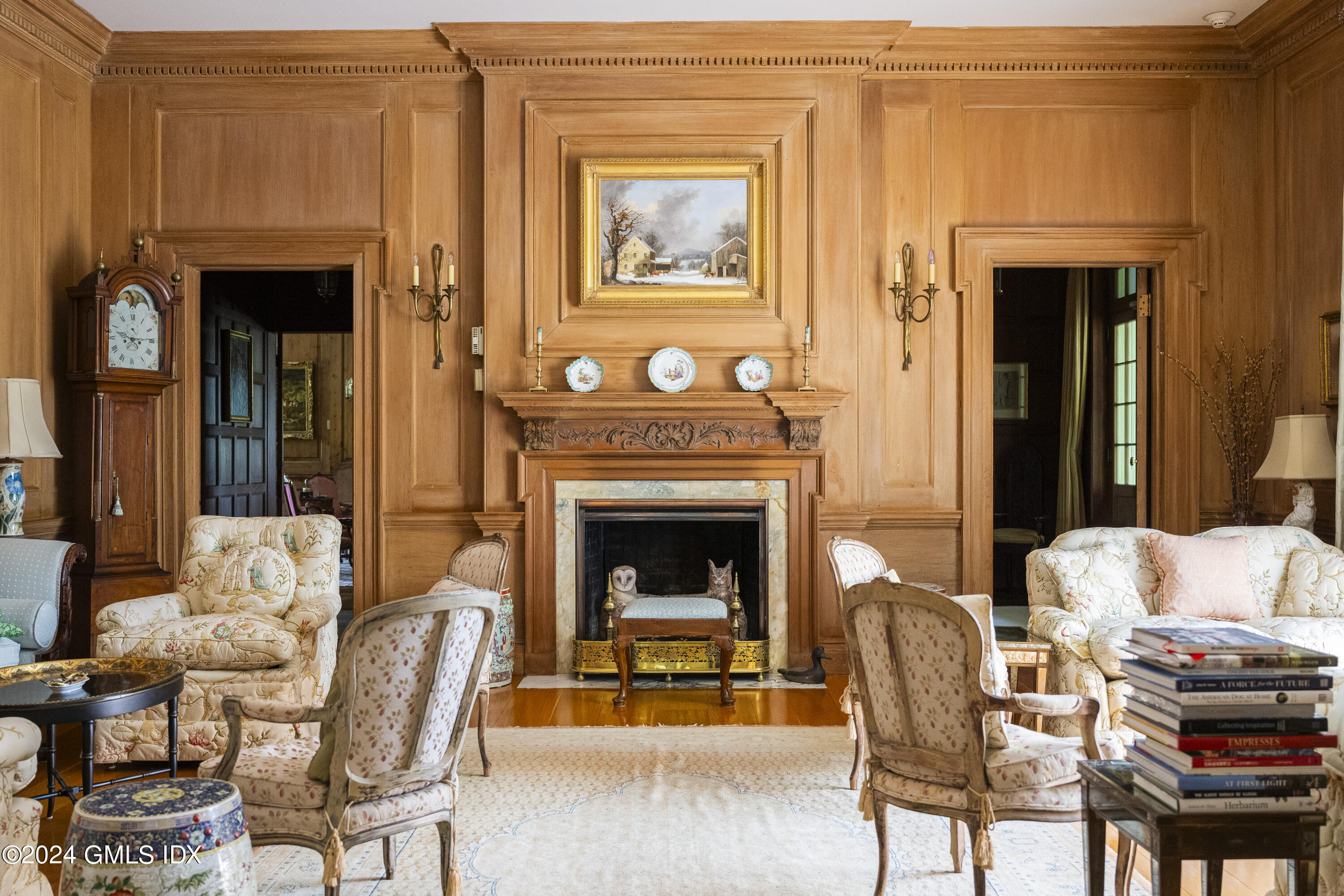 10 Cliffdale Road Greenwich, CT 06831 - Photo 7 of 31 a living room with furniture and a fireplace