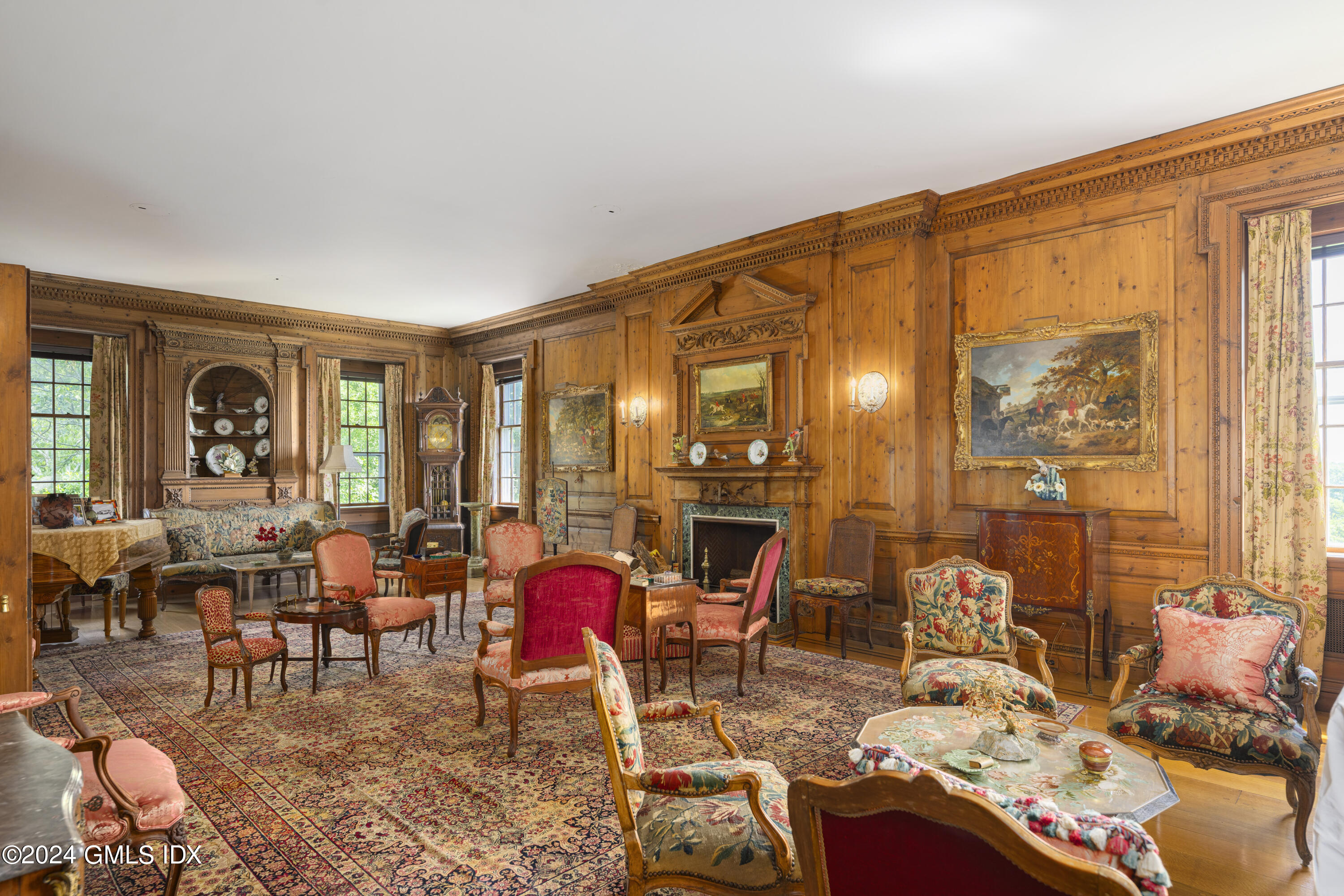10 Cliffdale Road Greenwich, CT 06831 - Photo 8 of 31 a living room with furniture and large windows