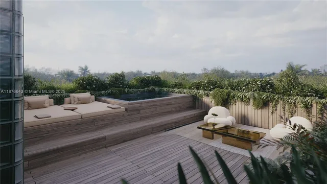 a view of a terrace with sitting area