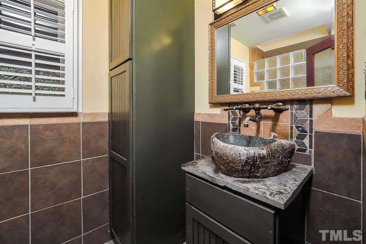 4009 Pleasant Grove Church Road Raleigh, NC 27613 - Photo 11 of 15 a room with a table and chairs