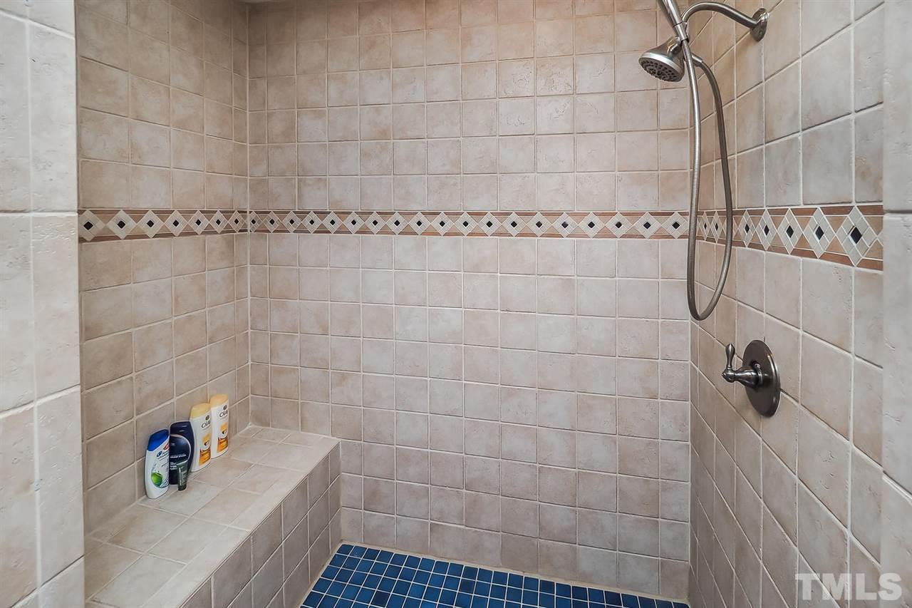 4009 Pleasant Grove Church Road Raleigh, NC 27613 - Photo 9 of 15 a bathroom with a shower
