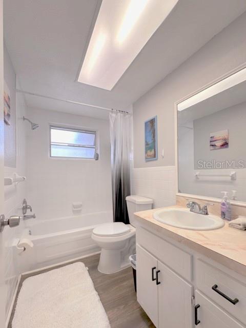 7924 Halsey Drive Port Richey, FL 34668 - Photo 12 of 26 a bathroom with a sink a toilet and shower