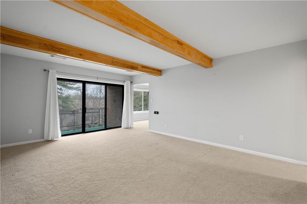 410 Abbeyville Road, Unit D Pittsburgh, PA 15228 - Photo 13 of 19 an empty room with window