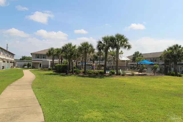 a view of outdoor space yard and front view of house