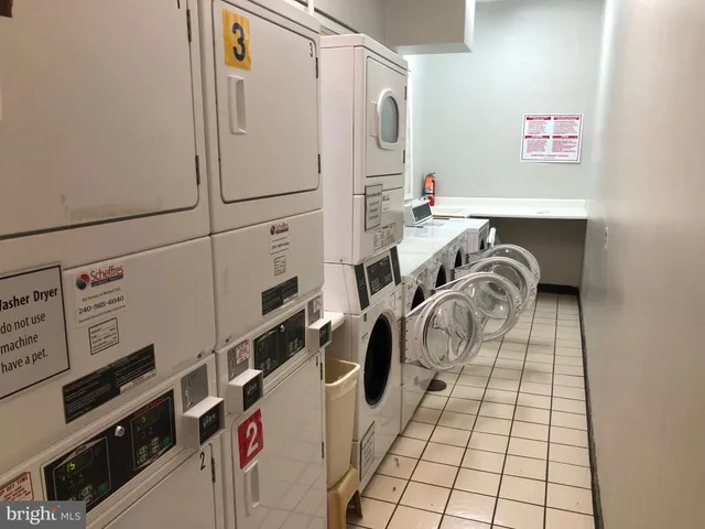 a view of a room with balcony and ocean view