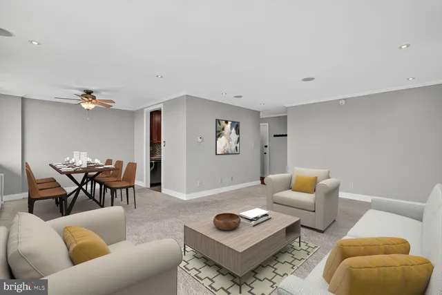 a front view of a residential apartment building with a yard