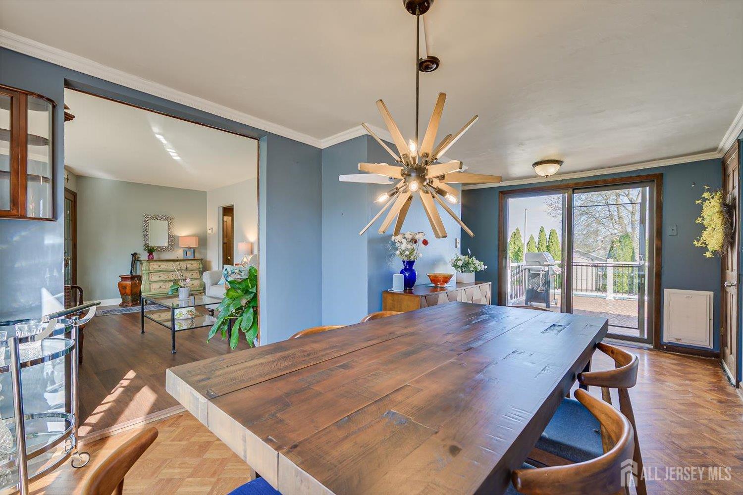 110 Normandy Road Colonia, NJ 07067 - Photo 14 of 57 a view of a dining room with furniture window and wooden floor
