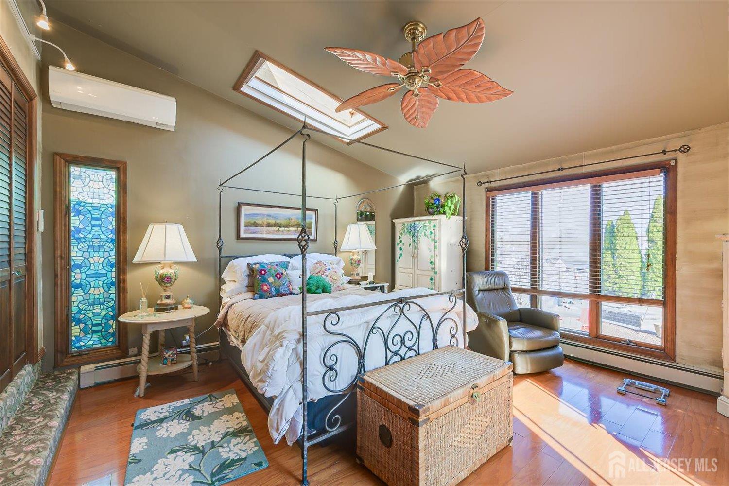 110 Normandy Road Colonia, NJ 07067 - Photo 20 of 57 a bedroom with furniture and a large window