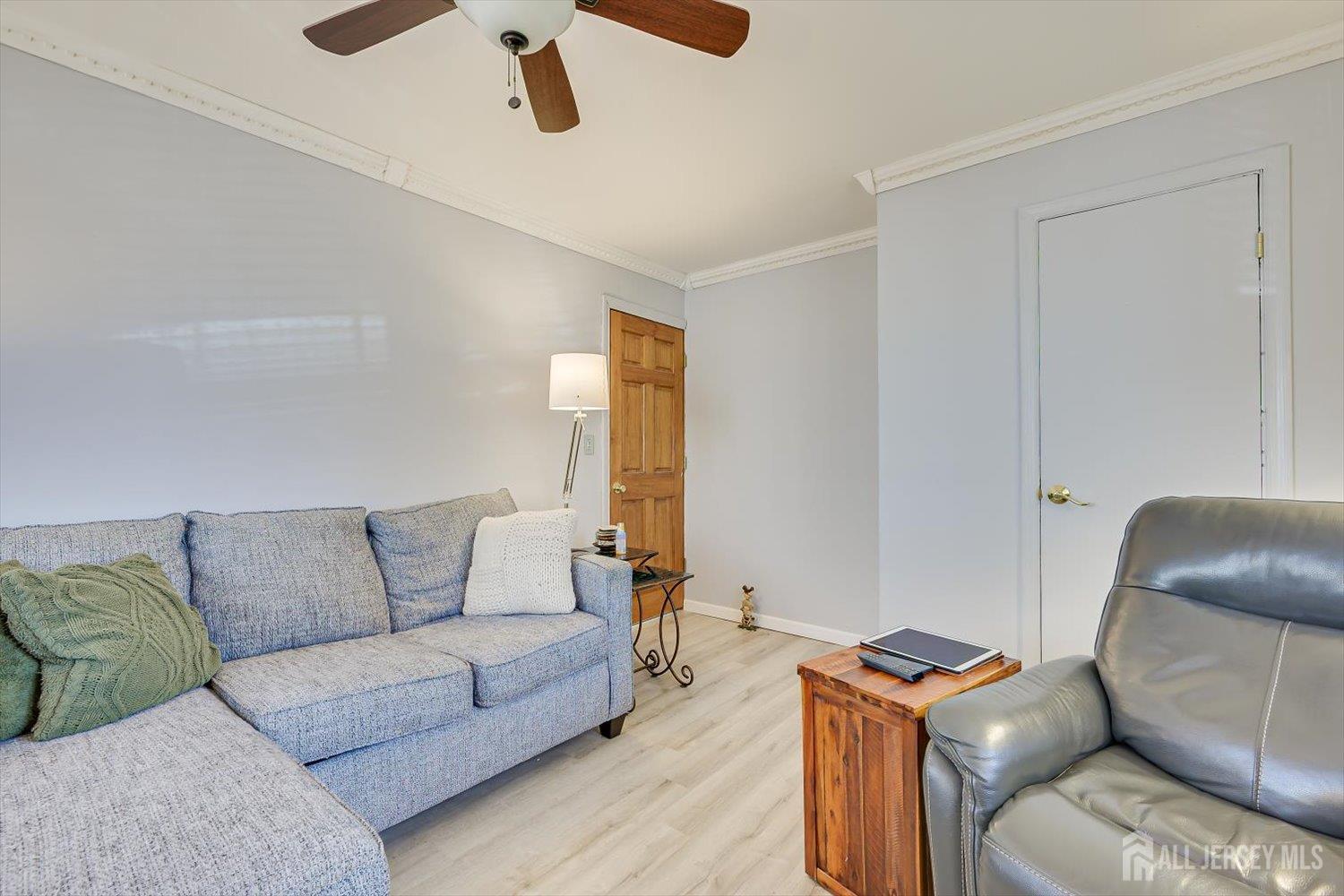 110 Normandy Road Colonia, NJ 07067 - Photo 25 of 57 a living room with furniture and a window