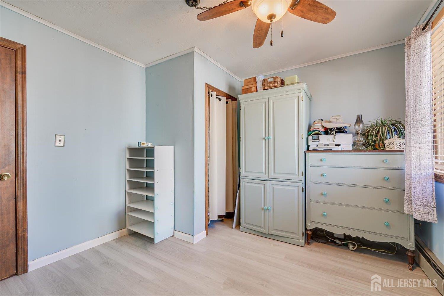 110 Normandy Road Colonia, NJ 07067 - Photo 27 of 57 a view of a livingroom with closet