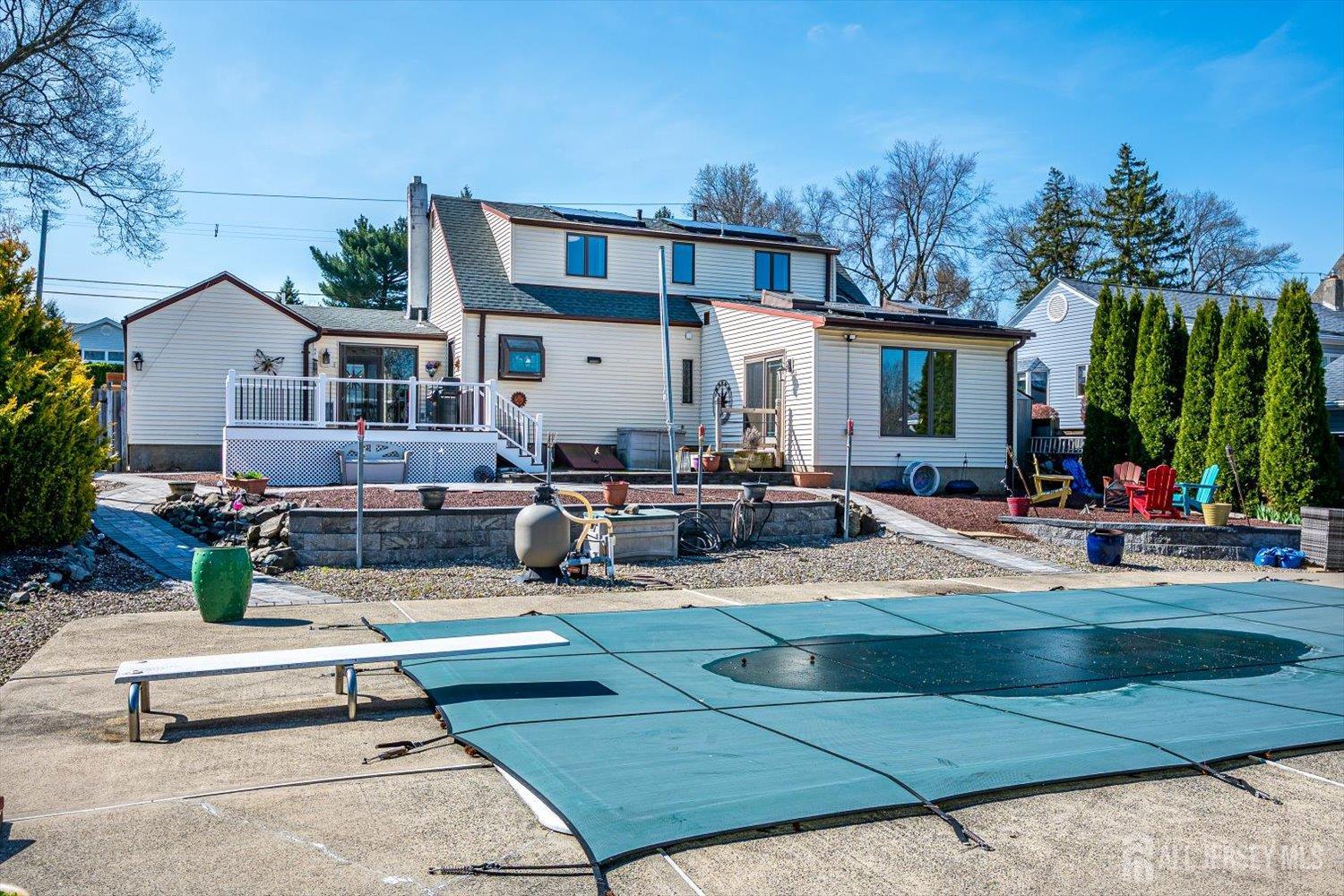 110 Normandy Road Colonia, NJ 07067 - Photo 48 of 57 a view of a backyard with a patio