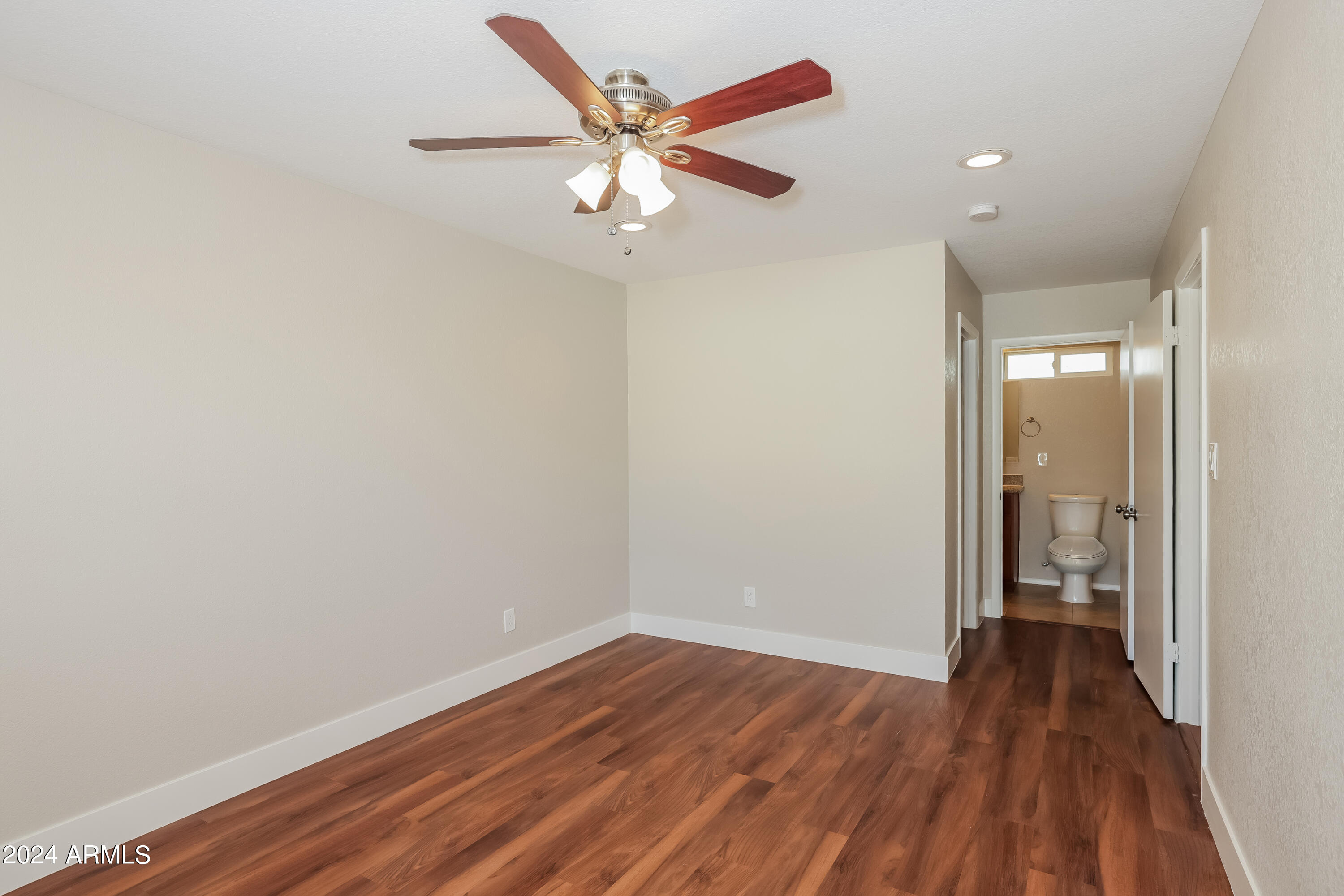 2138 East Monte Cristo Avenue Phoenix, AZ 85022 - Photo 7 of 16 022-photo-primary-bedroom-12091130