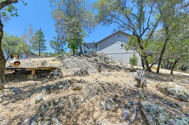 a view of outdoor space with wooden deck