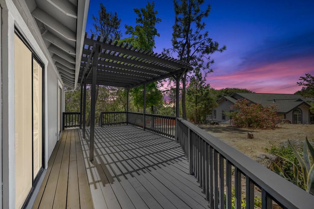 2071 Bogus Point Court Cool, CA 95614 - Photo 17 of 69 a view of balcony and wooden floor