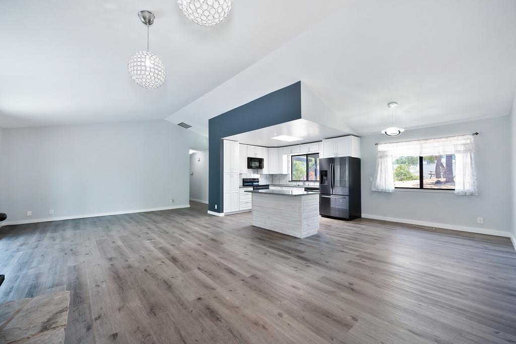 2071 Bogus Point Court Cool, CA 95614 - Photo 22 of 69 a view of a kitchen with a sink cabinets and wooden floor