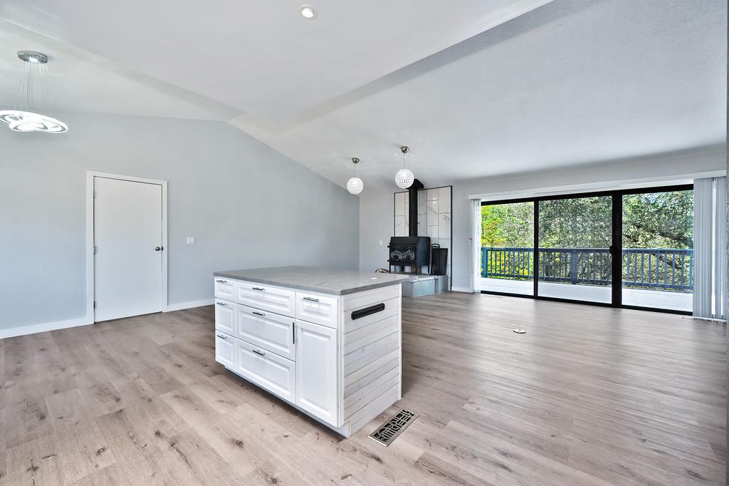 2071 Bogus Point Court Cool, CA 95614 - Photo 30 of 69 a hall with cabinets and wooden floor