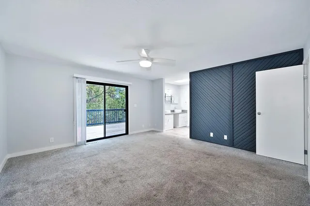 a view of livingroom with washer and dryer