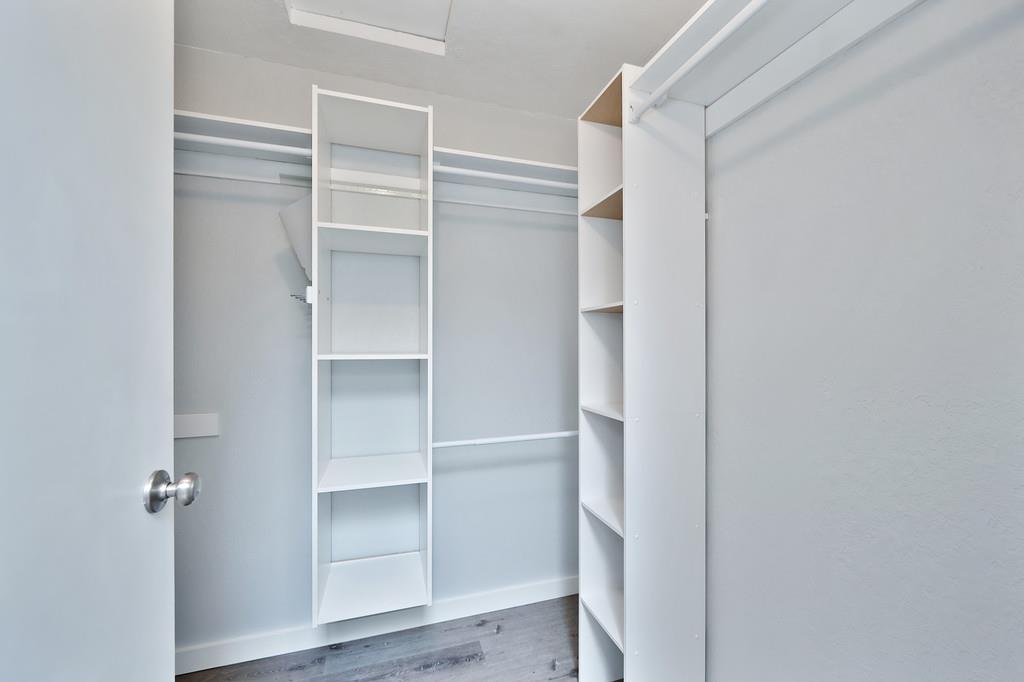 2071 Bogus Point Court Cool, CA 95614 - Photo 44 of 69 a view of walk in closet with empty racks