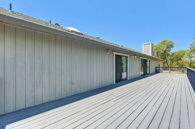 a view of swimming pool and mountain in the back