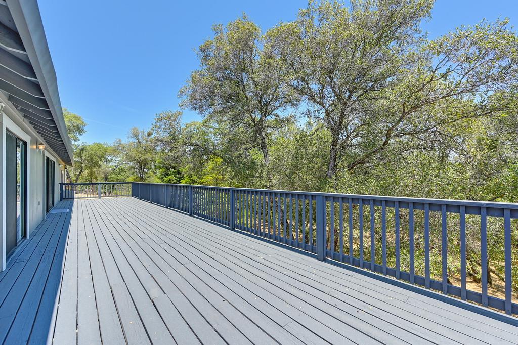 2071 Bogus Point Court Cool, CA 95614 - Photo 50 of 69 a view of balcony with wooden floor and fence