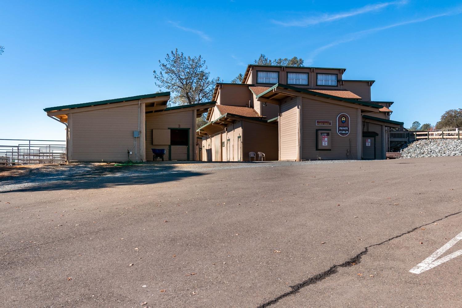 2071 Bogus Point Court Cool, CA 95614 - Photo 68 of 69 a front view of a house with a yard