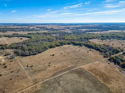 a view of a beach with a ocean view