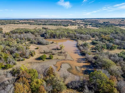an aerial view of mountain with beach