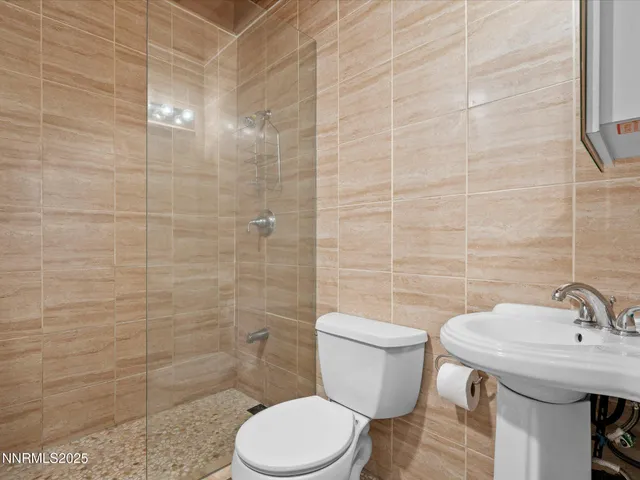 a bathroom with a sink and a toilet