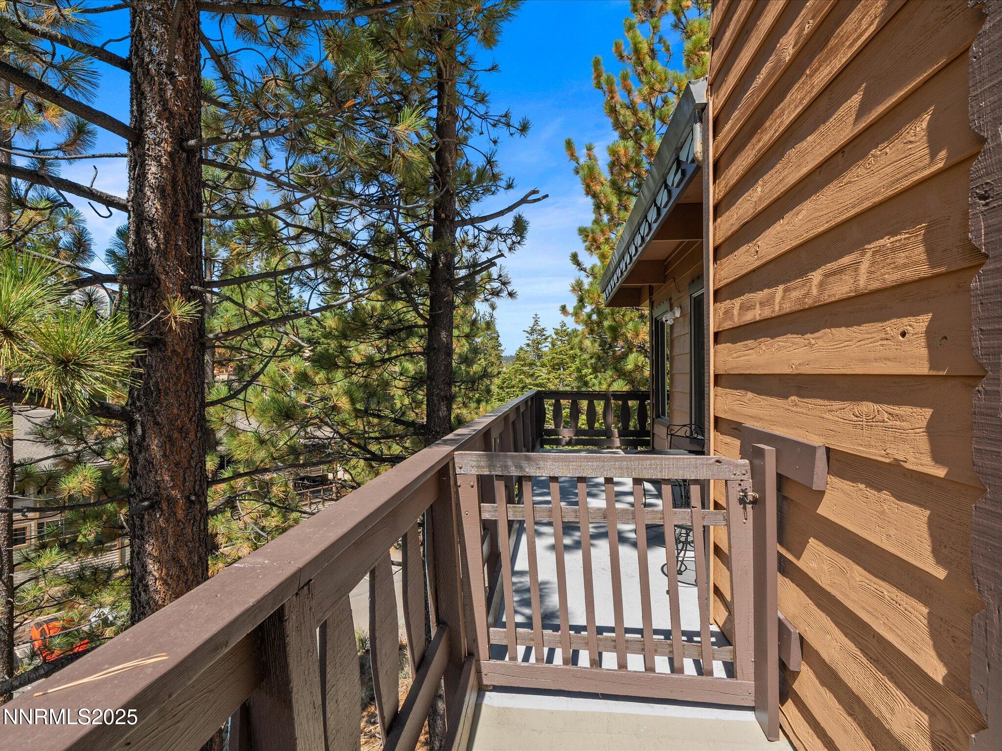 259 Tramway Drive, Unit 3 Stateline, NV 89449 - Photo 4 of 29 a view of a balcony with wooden floor and outdoor space