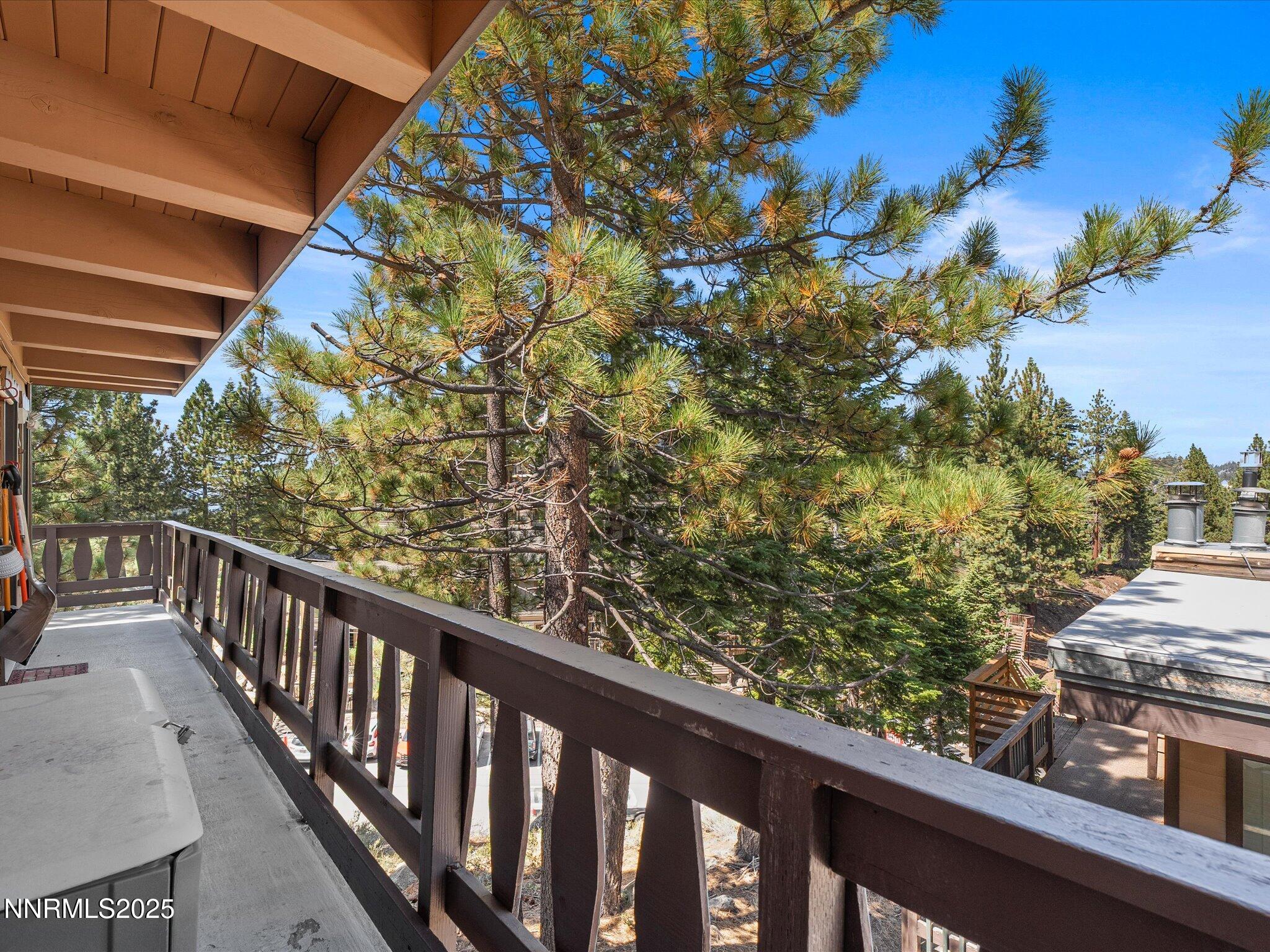 259 Tramway Drive, Unit 3 Stateline, NV 89449 - Photo 8 of 29 a view of a balcony with wooden fence