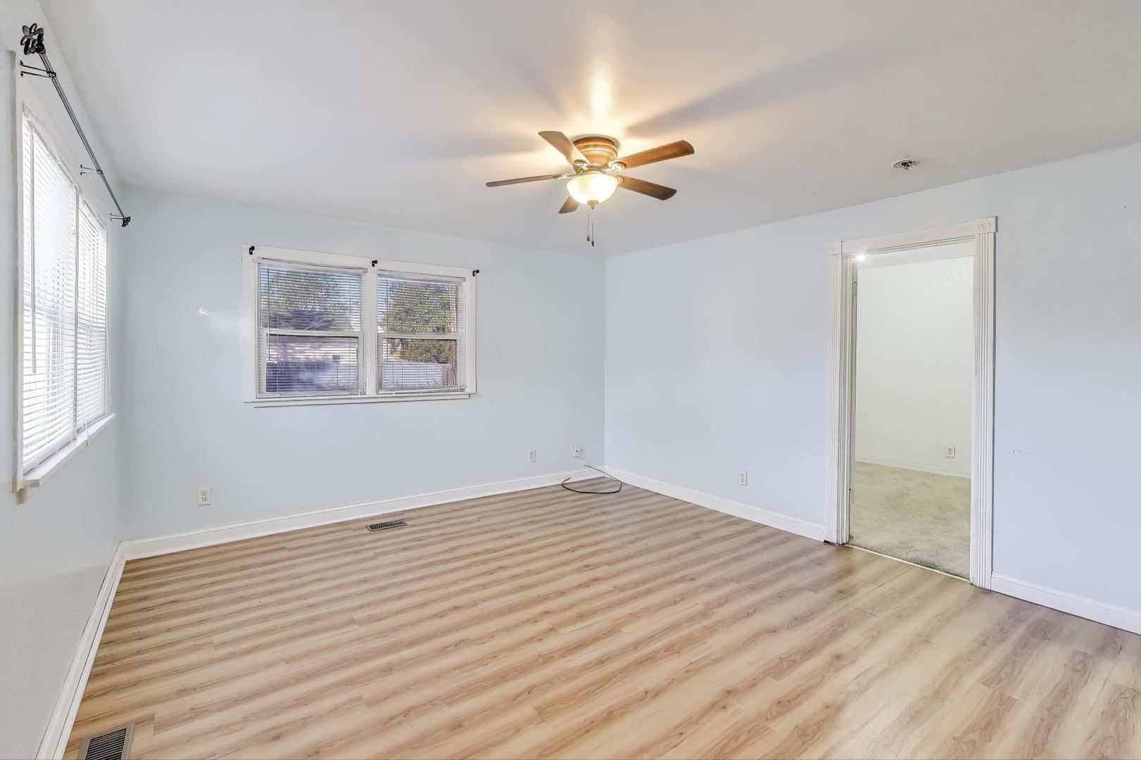 2524 Gilboa Avenue Zion, IL 60099 - Photo 11 of 33 a view of empty room with wooden floor