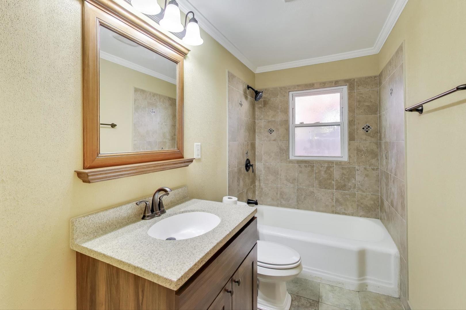 2524 Gilboa Avenue Zion, IL 60099 - Photo 23 of 33 a bathroom with a sink toilet tub and shower
