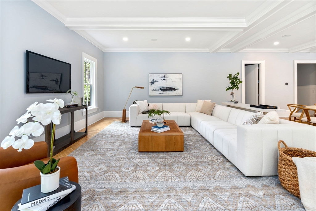 196 Pond Road Wellesley, MA 02482 - Photo 16 of 20 a living room with furniture and a flat screen tv