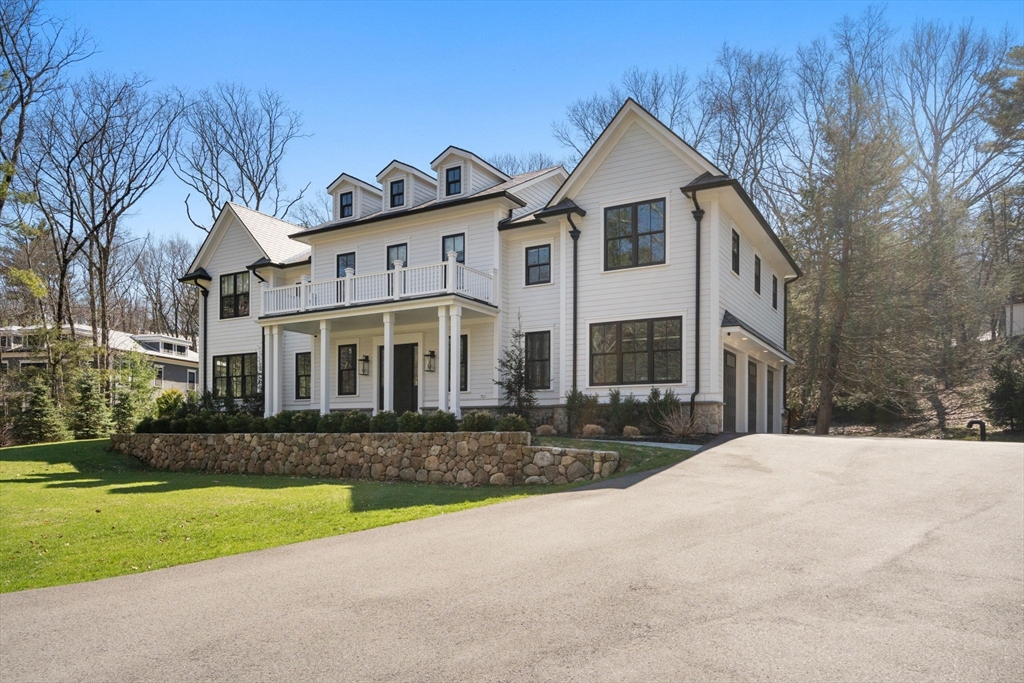 196 Pond Road Wellesley, MA 02482 - Photo 20 of 20 a front view of a house with a yard