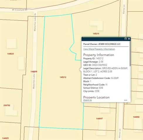 a picture of a glass window with white house