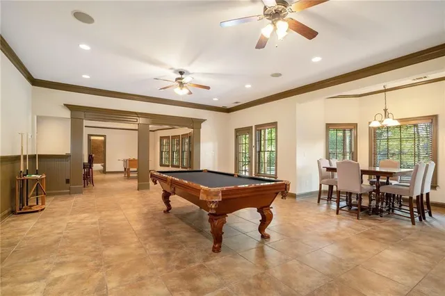 an aerial view of a house with a yard and garden