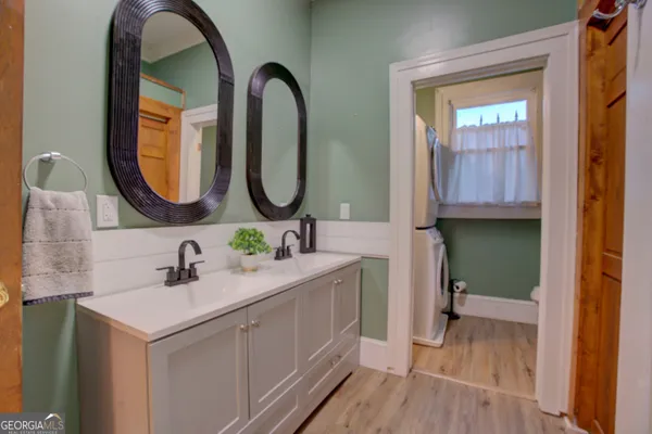 a bathroom with a toilet and a sink