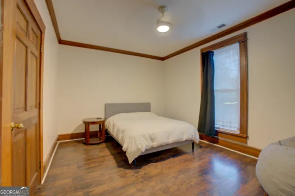 a bathroom with a toilet and a sink