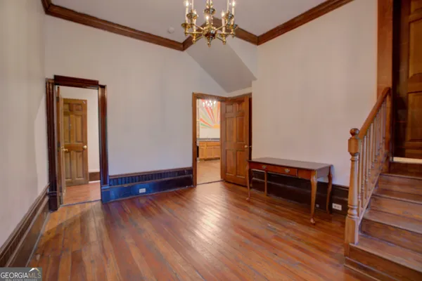 wooden floor and windows in an empty room