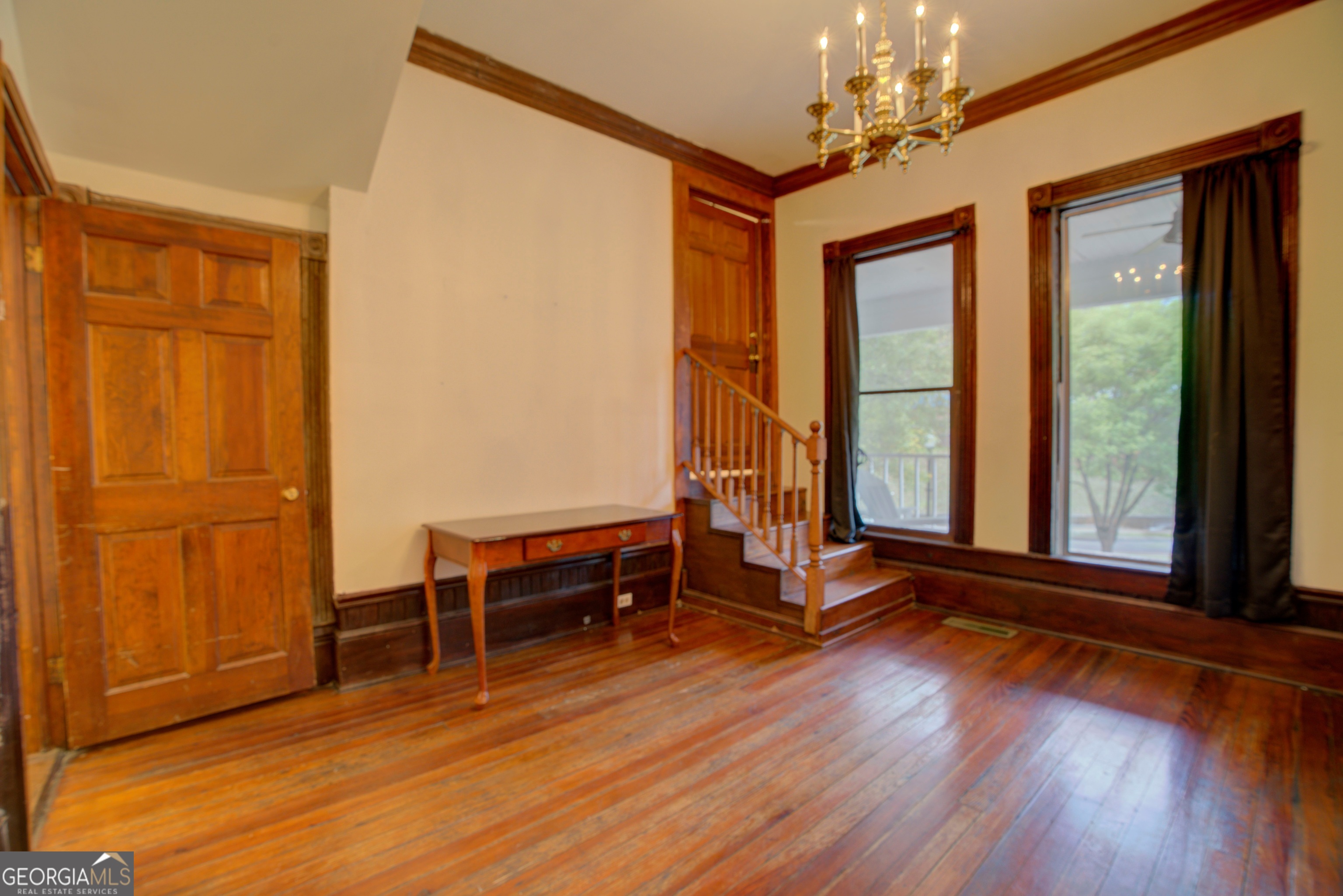 232 South Broad Street Rome, GA 30161 - Photo 19 of 37 wooden floor and windows in an empty room