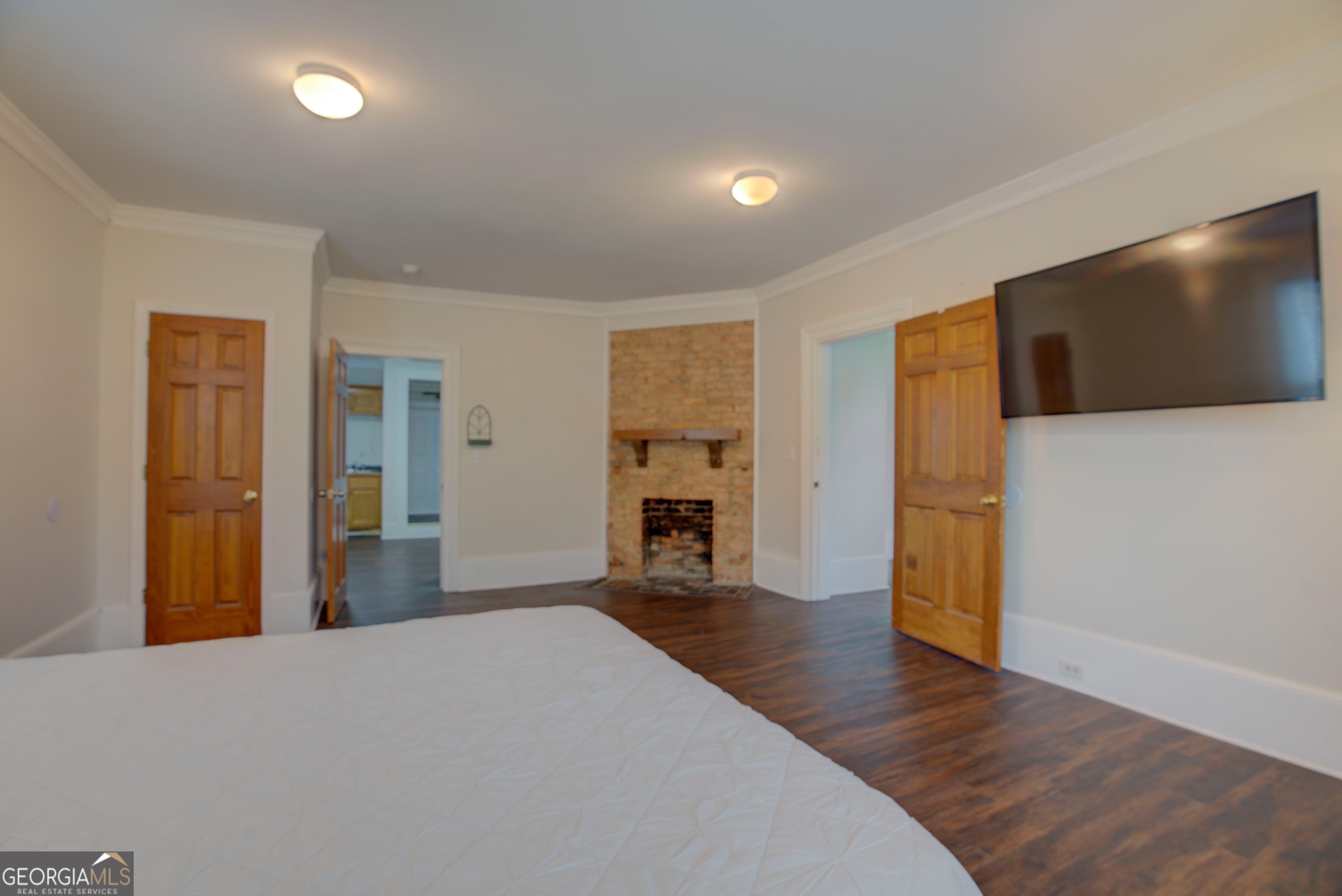 232 South Broad Street Rome, GA 30161 - Photo 27 of 37 a view of a livingroom with a fireplace cabinet and window